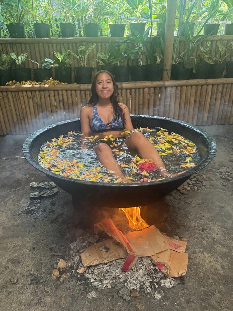 Maggie Faustino in the Philippines seemingly being boiled in a pot